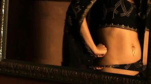 Brunette seductress strips down to belly dance